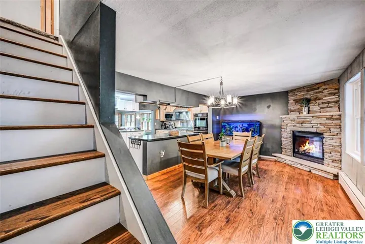 Dining Area w/ Staircase To 2nd Floor