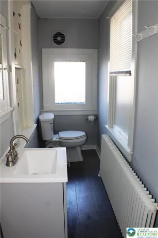 Half-Bath, with updated fixtures and classic sunken medicine cabinet