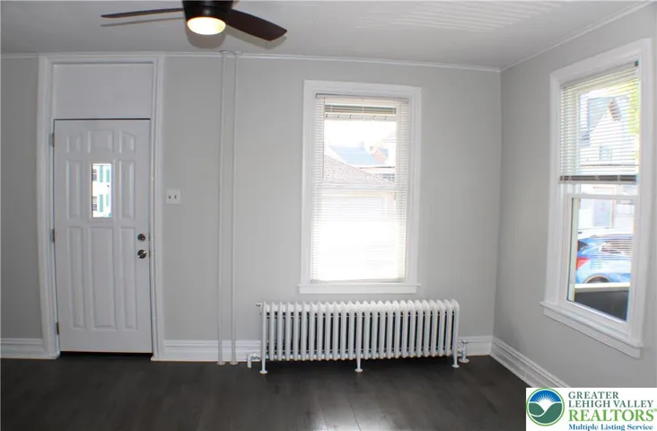 Lots of natural light, new windows, ceiling fan...