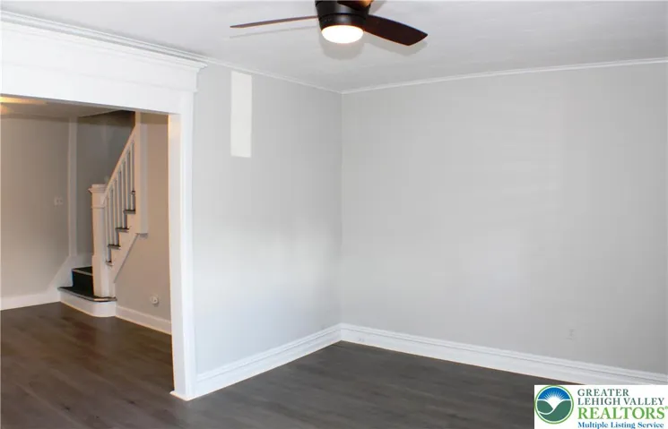 Living room flows into the Formal Dining room