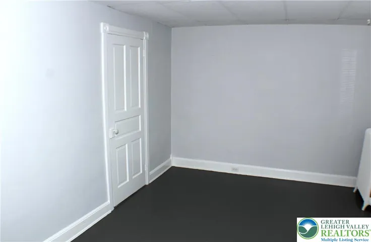 This bedroom is the smaller of the 3