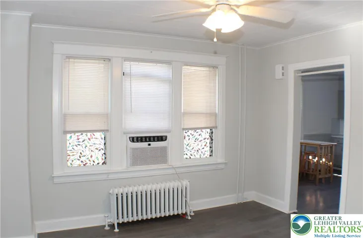 Dining room has lots natural light and a ceiling