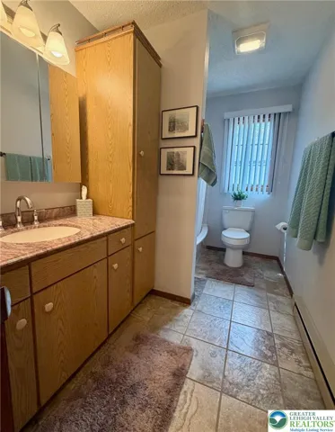 Modern bath with built-in cabinetry