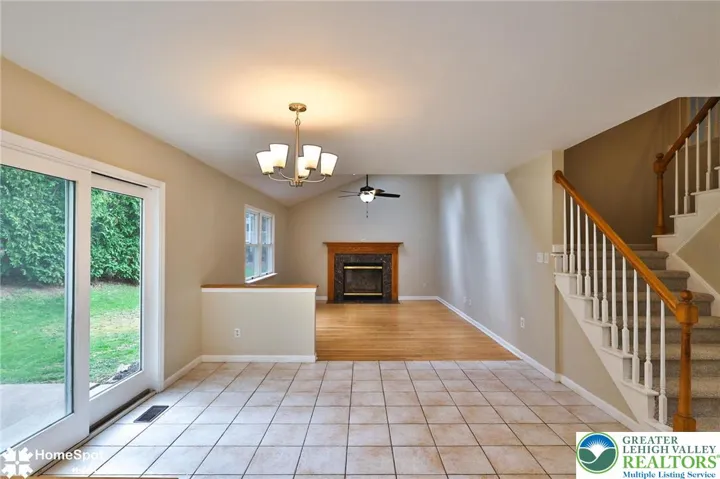 Breakfast area open to vaulted family room
