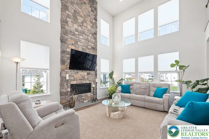 Floor to ceiling Gas, Stone fireplace.