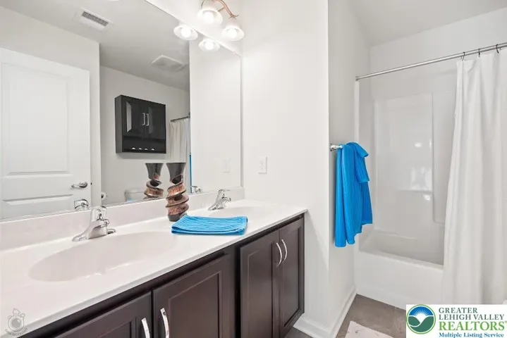 Dual Vanity Second Floor Bath.