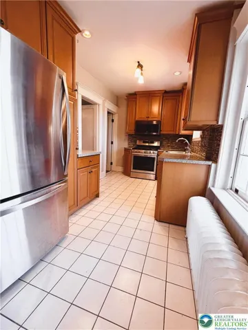 kitchen is updated, with nice big gas-burning stove.