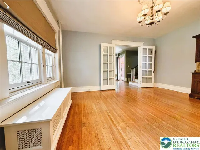 french glass doors lead to the dining room.