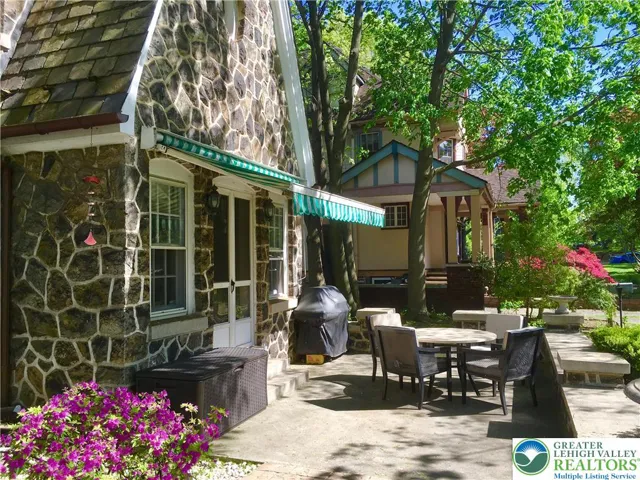 unparrallelled patio, out front! with a great retractable awning in case of sun-overload.
