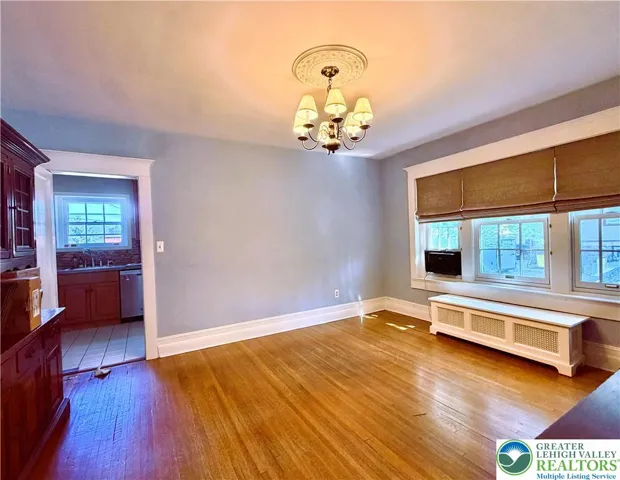 dining leads to the kitchen and a first fl half bath.