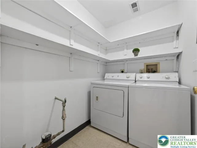 Oversized Laundry Room with Shelving