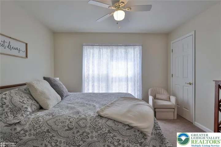 2nd bedroom is bright and airy
