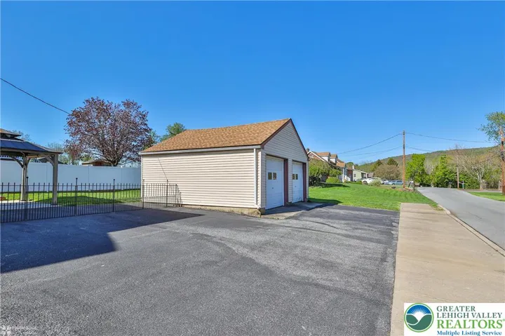 2 car garage with additional parking