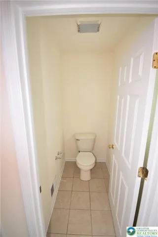 Separate water closet for  master bathroom.