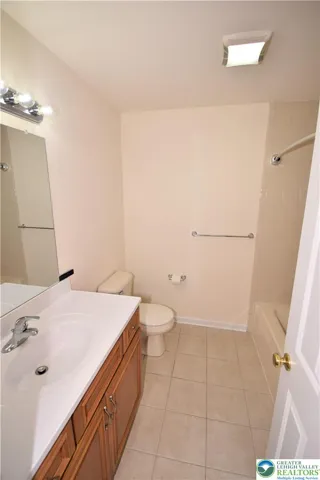 Full bathroom with tub