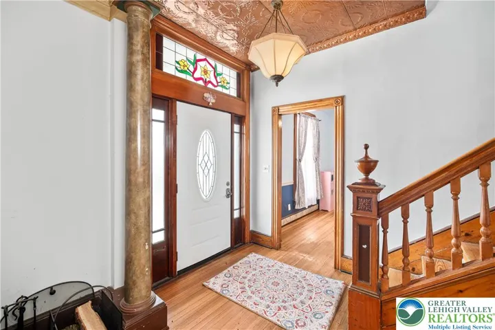 Foyer with beautiful stained glass.