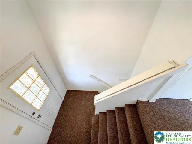 Stairs to Partially finished basement