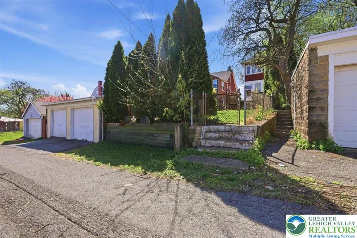 Parking Pad / Back Yard entry way.
