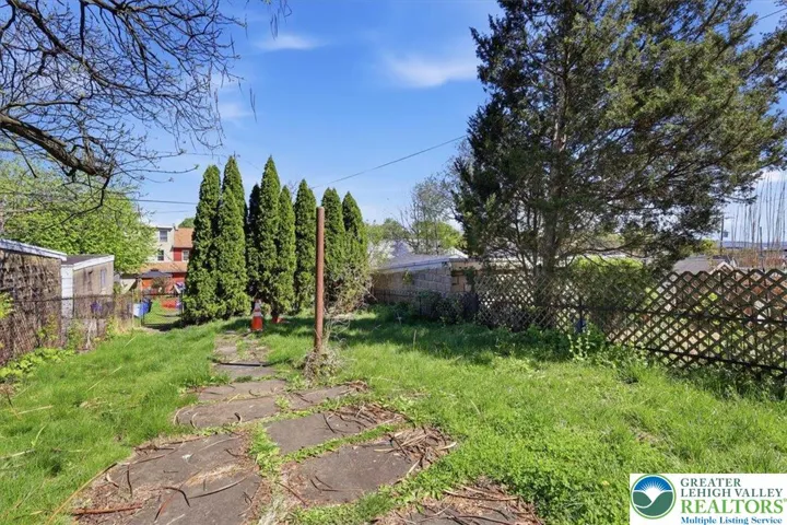 Fully fenced in yard view 2