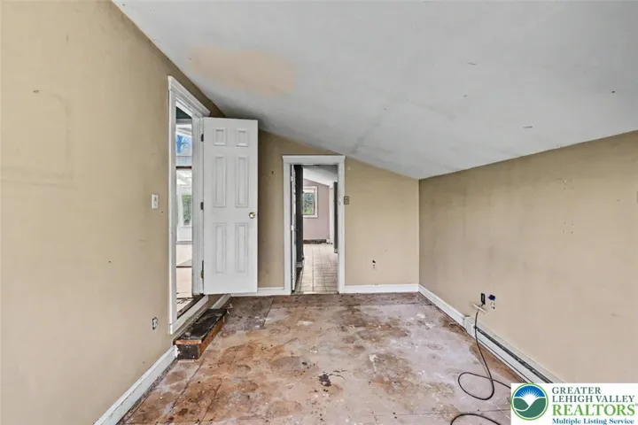 The Primary Bedroom can accommodate a King sized bed with accent pieces.
