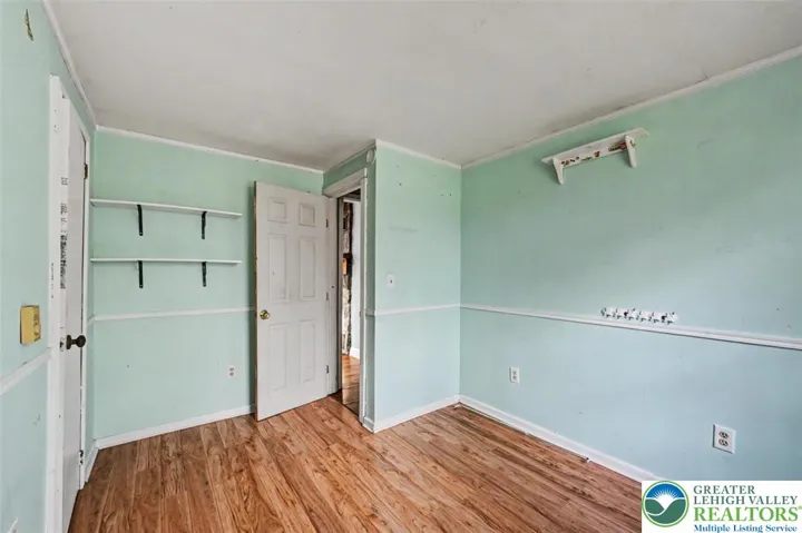 Bedroom 3 is small and off the Living Room/Primary Bedroom. It would make a great home office or nursury.

