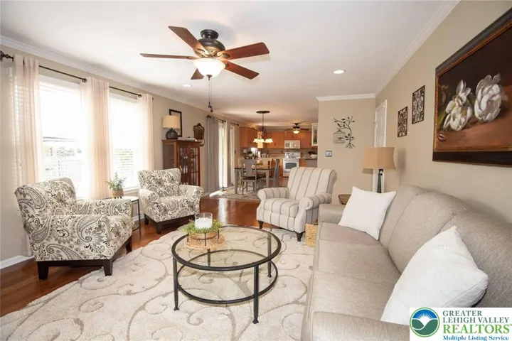 beautiful wood flooring in the family room with ample natural light