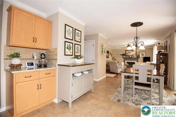 breakfast/dining area in the kitchen , small counter would be perfect for a coffee bar