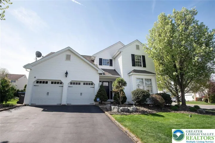 2 car garage with long driveway provides for ample off street parking