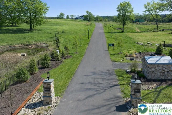 Development Entrance with Gas Lanterns