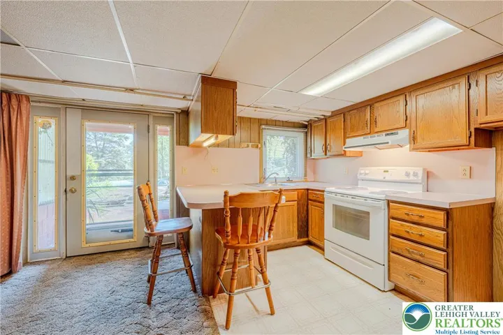 Lower Level Exit to Patio & Pool