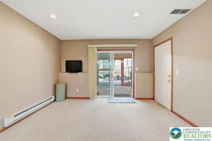 Rec Room, Sunroom, Garage Entrance