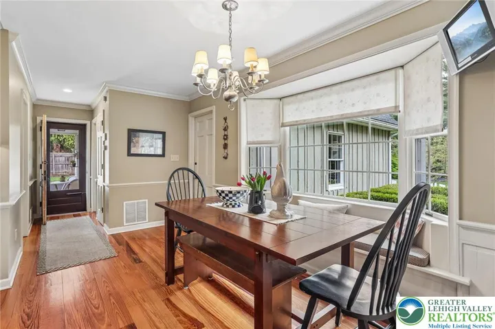 Additional casual eating location with access to Garage, Hall to Laundry and half Bathroom