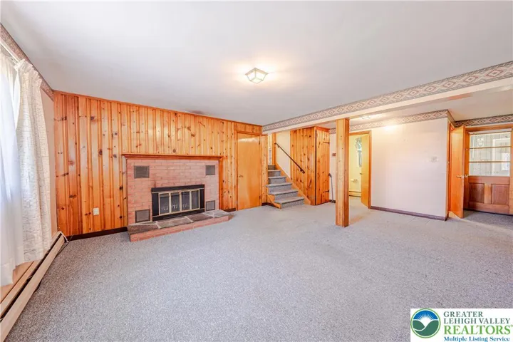 Family room with wood burning fireplace