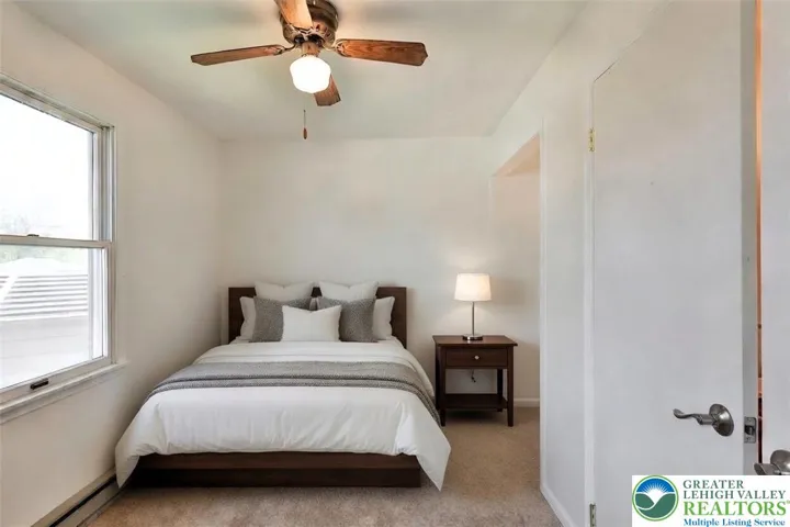 1st floor bedroom w/ en' suite full bathroom, Virtually Staged