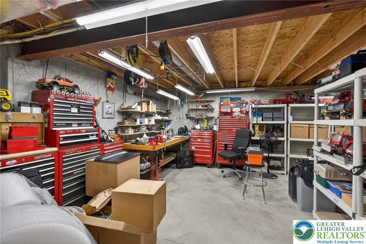 Unfinished basement with storage and future potential