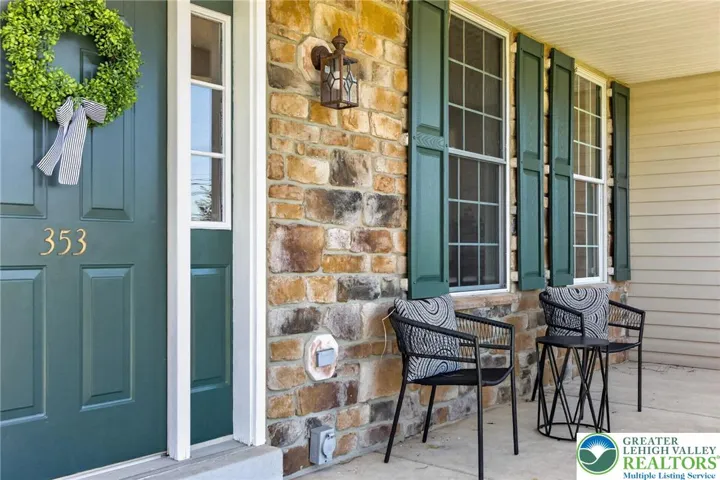 Welcoming front entry with covered porch