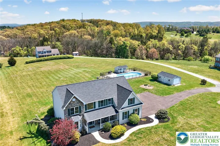 Set on 2+ acres with scenic views