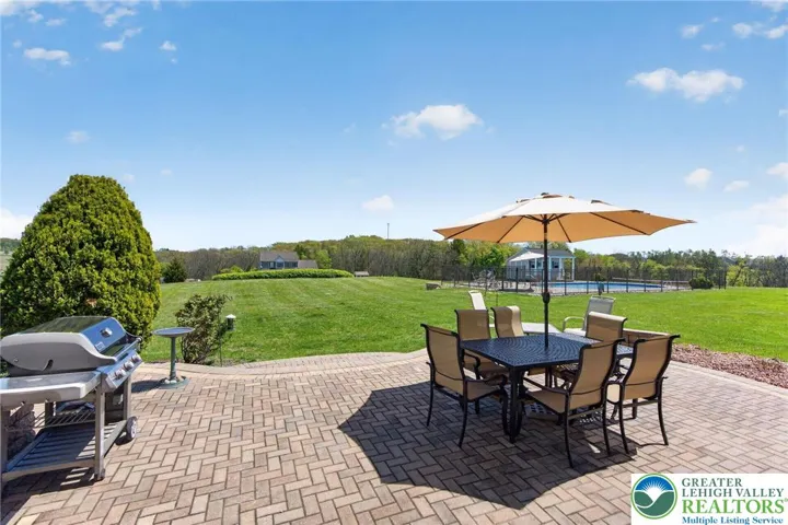Stone patio perfect for outdoor dining and entertaining