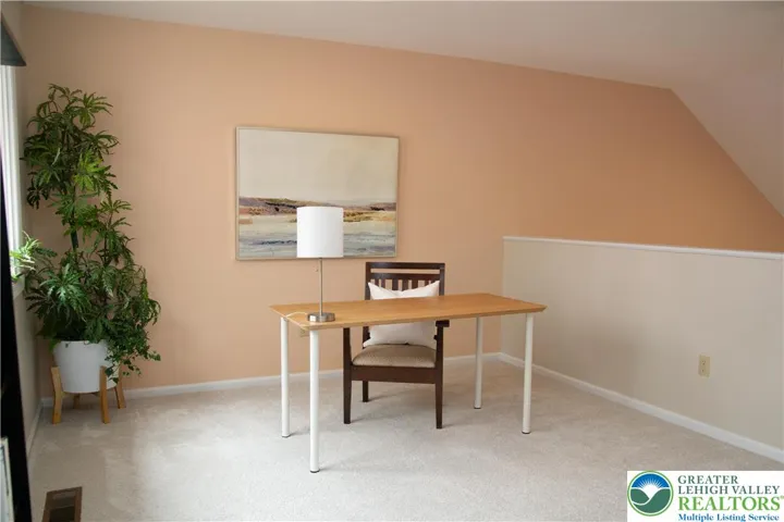 Loft staged as an office but could easy be modified to be a third bedroom.