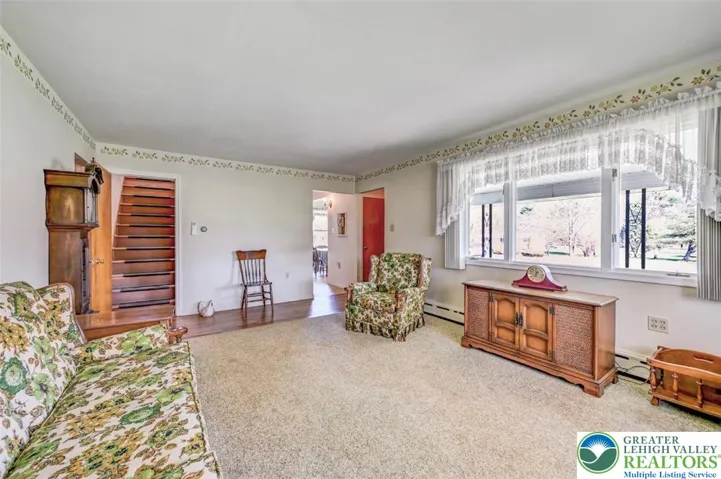 Picture Window & Staircase To 2nd Floor