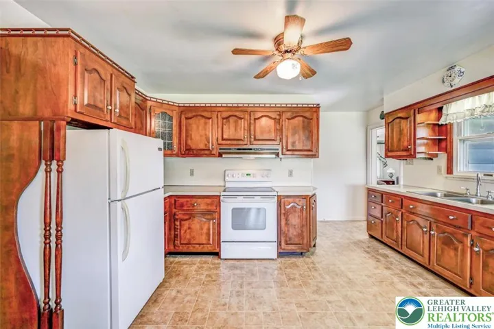Abundant Cabinetry & Basement Access