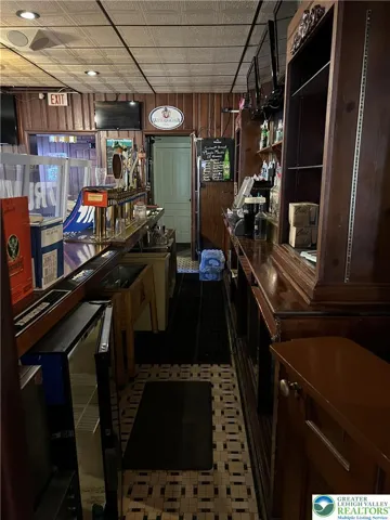 smaller of the two bars