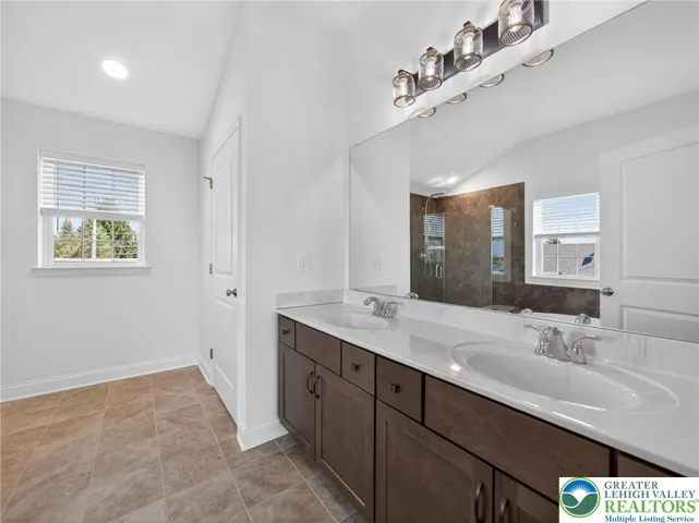 Master bathroom with dual vanities