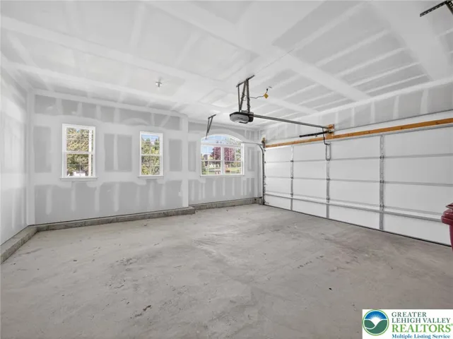 Double garage with insulated doors, windows
