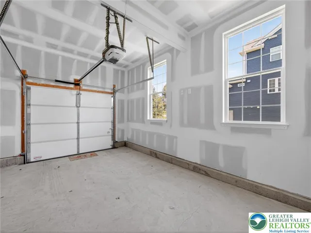 Single garage with windows, courtyard entrance