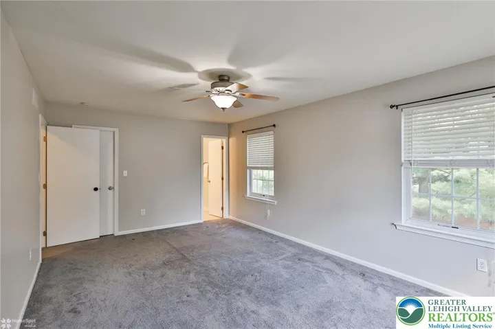 Primary suite with ensuite bath and walk in closet