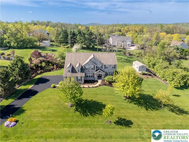 Beautiful setting. One acre lot. Manicured grounds.