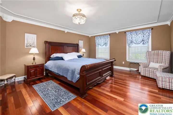 Main BR area. Beautiful HW floors, crown moulding.