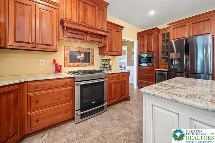 Kitchen is impressive:  cherry cabinets, granite counters.