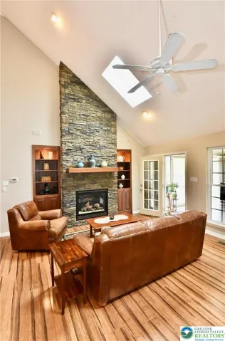 Custom Floor to Celling Stacked Stone Fireplace